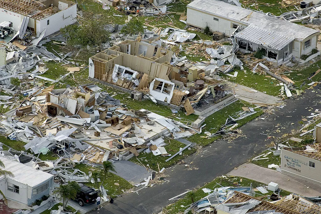 Image of the aftermath of a hurricane on the ground. Houses destroyed.