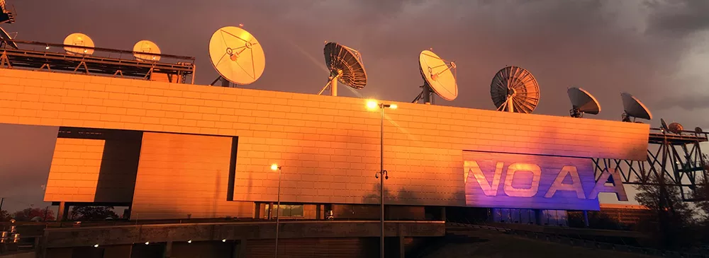 NOAA's Satellite Operations Facility in Suitland, Maryland, seen at sunset.