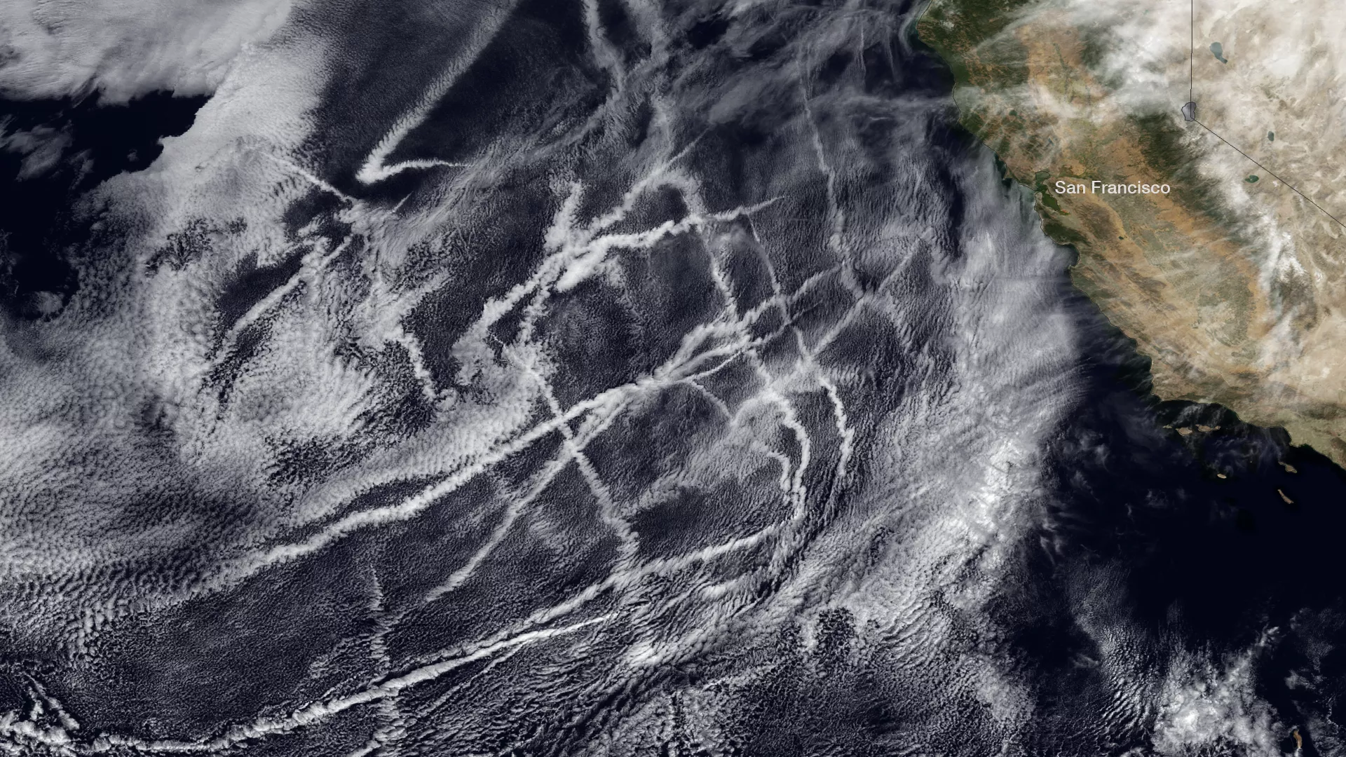 As cargo ships steam across the oceans, the tiny aerosol particles in their exhaust act as cloud nuclei, or seeds around which moisture in the atmosphere can condense
